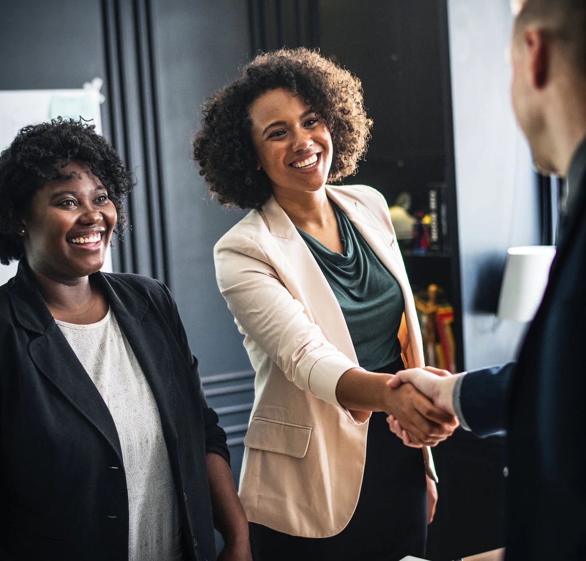 Business leaders connecting through a handshake